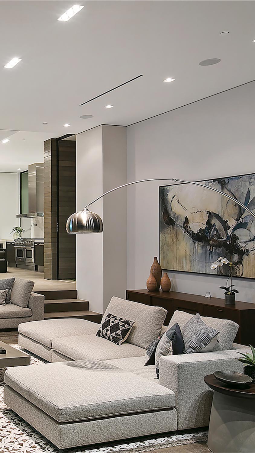 Contemporary living room with large sectional and decor