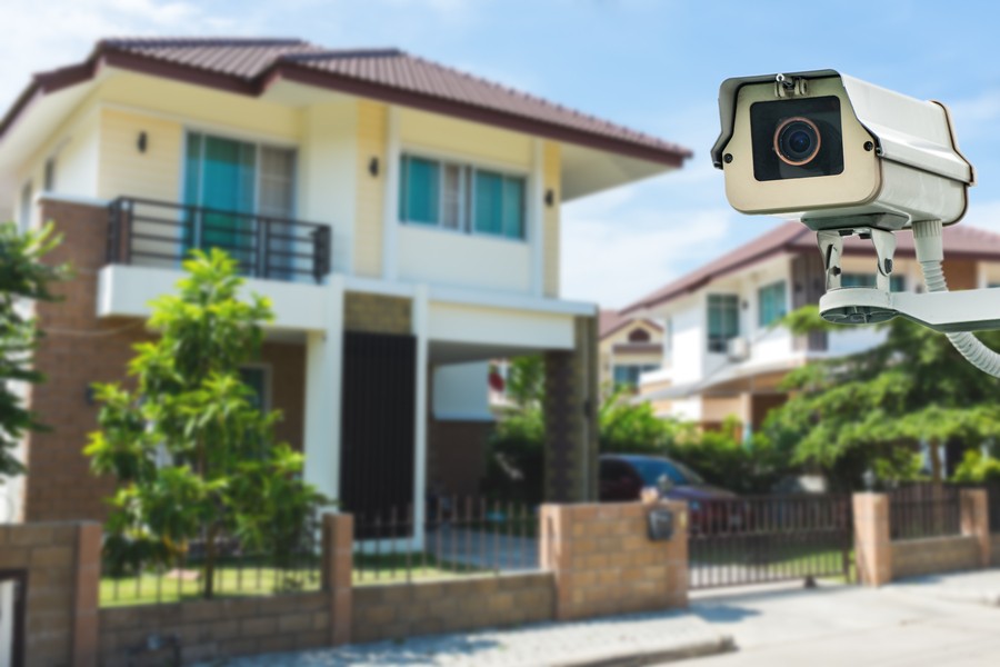 CCTV Camera with house and village in background