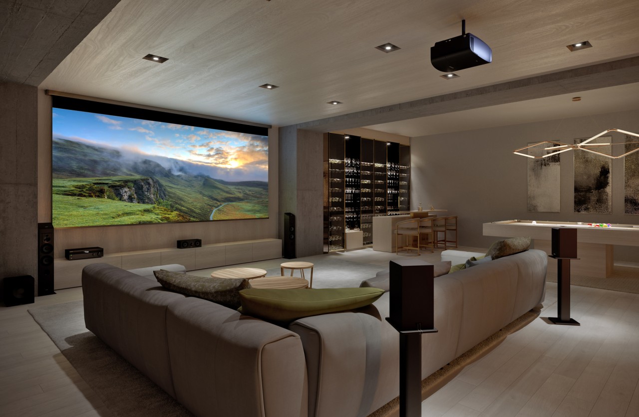 Dedicated home theater with a ceiling-mounted projector, sectional and large screen.