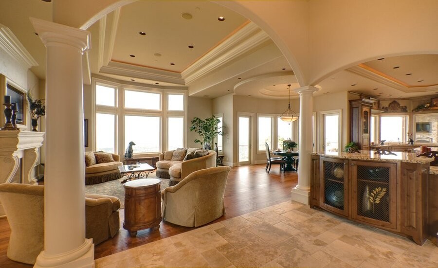 An open living space featuring whole-home audio in-ceiling speakers.